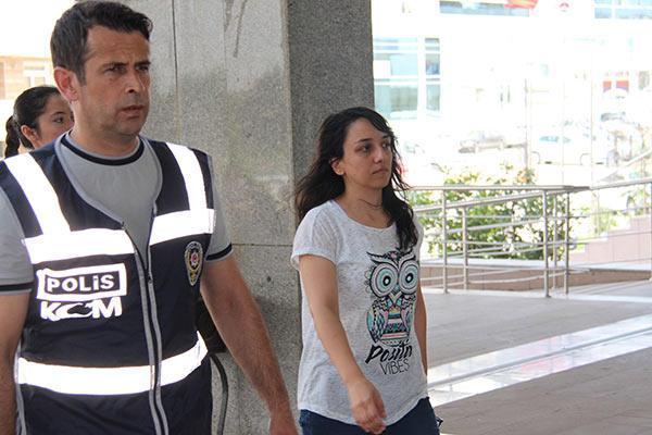 Kadın hakim ve savcı eşi, polis aracına el ele bindi