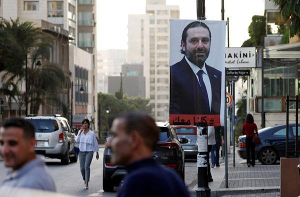 Son dakika... 11 gün sonra ilk fotoğraf Hariri Pariste poz verdi