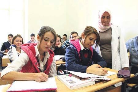 Kamuda başörtü yasağı son buldu