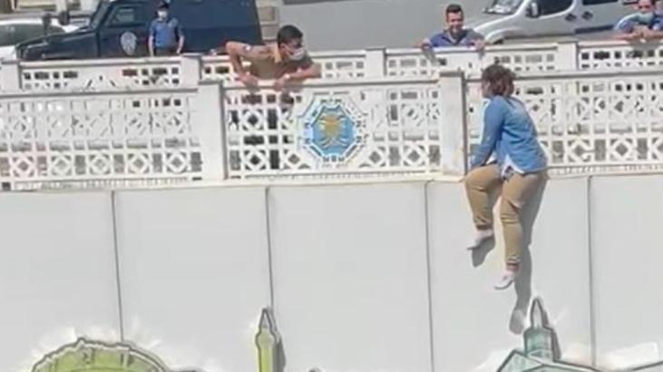 Genç kızın intiharını önleyen polisler, yere çelik yeleklerini serdi