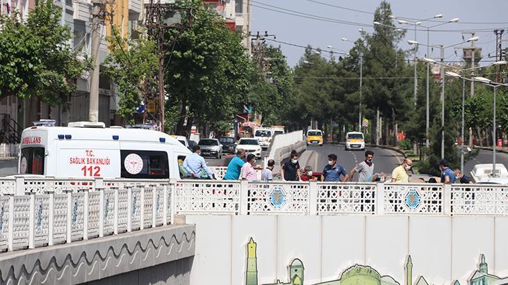 Genç kızın intiharını önleyen polisler, yere çelik yeleklerini serdi