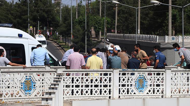 Genç kızın intiharını önleyen polisler, yere çelik yeleklerini serdi