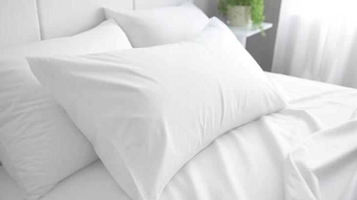 Çamaşır makinesine hiç gerek yok Tek seferde yastıkları sakız gibi ağartan tüyo