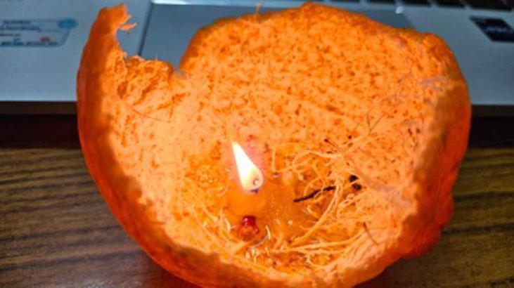 Mandalina kabuğundan mis kokulu mumluk Ortadan kesin, görüntüsü çok şık Mandalina kabuğundan mis kokulu mumluk Ortadan kesin, görüntüsü çok şık