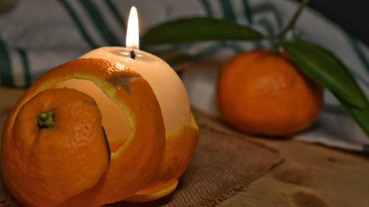 Mandalina kabuğundan mis kokulu mumluk Ortadan kesin, görüntüsü çok şık Mandalina kabuğundan mis kokulu mumluk Ortadan kesin, görüntüsü çok şık