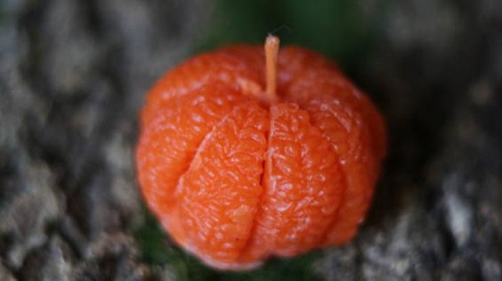 Mandalina kabuğundan mis kokulu mumluk Ortadan kesin, görüntüsü çok şık Mandalina kabuğundan mis kokulu mumluk Ortadan kesin, görüntüsü çok şık