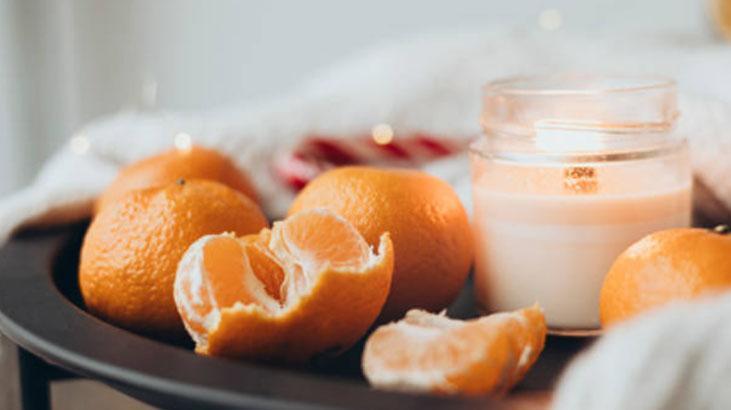 Mandalina kabuğundan mis kokulu mumluk Ortadan kesin, görüntüsü çok şık Mandalina kabuğundan mis kokulu mumluk Ortadan kesin, görüntüsü çok şık