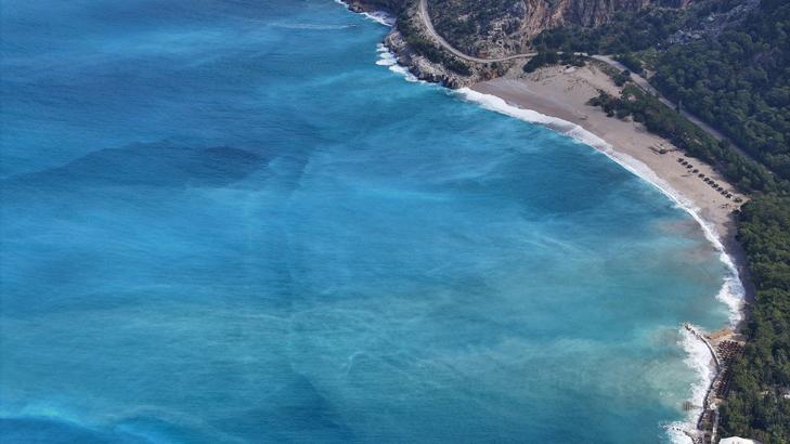 Ölüdeniz’in rengi bir anda turkuaza döndü! Yağış sonrası ortaya çıkan manzara havadan görüntülendi