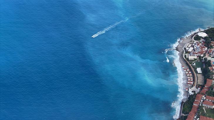 Ölüdeniz’in rengi bir anda turkuaza döndü Yağış sonrası ortaya çıkan manzara havadan görüntülendi