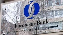 Büyüme tahminini yükseltti