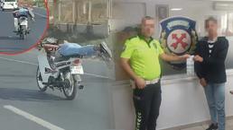 Motosikleti yüzüstü yatarak kasksız kullandı; cezası belli oldu
