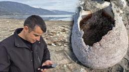 Yüzyıllardır suyun altındaydı! Kıyıya vuran küplerin içinden çıktı