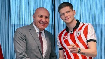 Logi Tomasson'un imza töreninden kareler