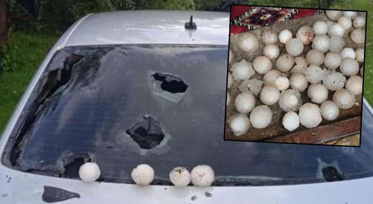 Kar topu büyüklüğünde dolu! Araçların camları kırıldı
