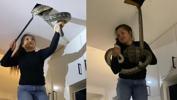 Tavandan gelen sesler için duvarı deldi! Devasa pitonu tek eliyle yakaladı