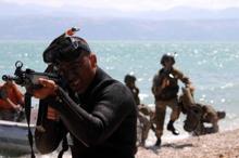 Elleri, ayakları ve gözleri bağlı suya atıldılar