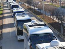 Bayraklı ağır silah konvoyu