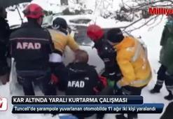 Kar altında yaralı kurtarma çalışması
