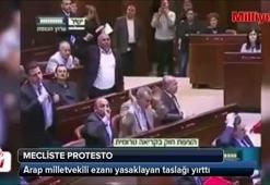 Ezan yasağı taslağını yırtıp attı