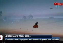 Paraşütçüyü kurtarmaya gelen helikopter...