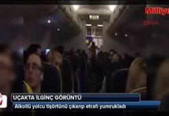 Uçakta alkollü yolcudan ilginç görüntü