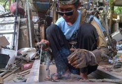 Hurdalardan biyonik kol yaptı