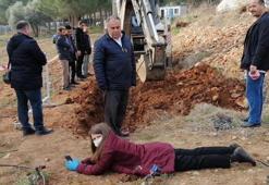 Kadın profesör kepçenin önüne yattı