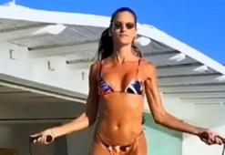 Izabel Goulart önce ip atladı, sonra havuza daldı...