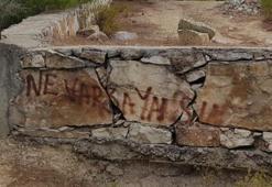 Hatay'daki yangın bölgesi yakınında 'Ne varsa yansın' yazısı