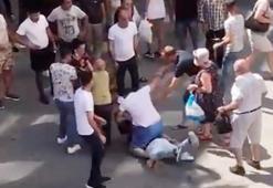 Şehrin göbeğinde tekme tokat kavga! Ayırmaya çalışanlar da dahil oldu
