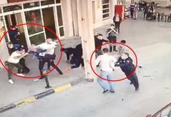 Polisin silahını aldı, dehşet saçtı! Yaralılar var