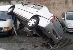 Freni boşalan otomobil otoparktaki araçların üzerine uçtu