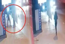 Hiç tanımadığı kadının başına taşla vurmuştu, yakalama kararı çıkarıldı