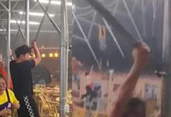 Çin’de şiddetli rüzgar tenteye tutunan insanları uçurdu