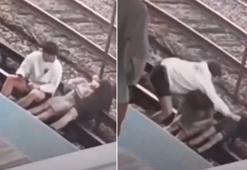 Akıma kapılıp kaskatı kesildiler! Tren raylarında kalp krizi geçirdi