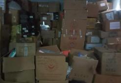 Hatay'da akılalmaz olay! Polis depoyu bastı, içeriden yardım kolileri çıktı