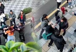 Liseli kızların sokak ortasında saç saça baş başa kavgası