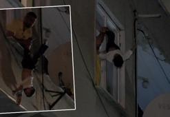 Başakşehir'de korku dolu anlar! Çocuğunu rehin alıp camdan aşağı sarkıttı