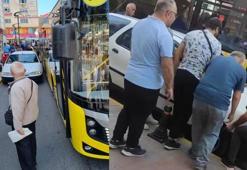 Otobüsü engelleyen otomobili vatandaşlar el birliği ile kaldırdı