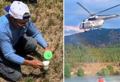 Zorunlu iniş yapan helikopterdeki yangın söndürme ekibini ayranla serinleten köylü kalpleri ısıttı
