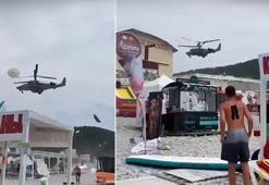Plajda Ka-52 kaosu! Panik kamerada: Şemsiyeler ve şezlonglar havada uçuştu