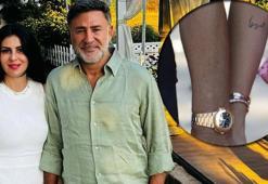 İzzet Yıldızhan'a eşinden jest! Aşkını kolunu kazıttı