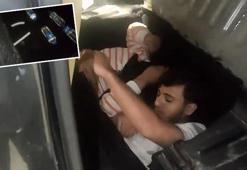 Şeytanın aklına gelmez! Otomobilin altına saklanmışlar ve nefes alabilmeleri için düzenek kurmuşlar