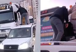 Aracın tavanına çıkıp TIR' şoförünü darbettiler