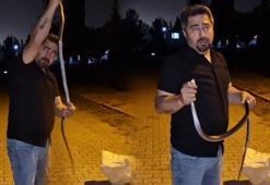 Çamaşır makinesinde yılan avı! Metrelerce uzunlukta, elleriyle çıkardı