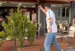 Tepki gösteren kadına 'Boğazını keserim' diyen sürücü yakalandı