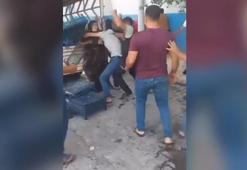 Semt pazarı savaş alanına döndü: Kadın ve pazarcı kasalarla birbirine girdi