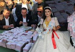 Gelini altına damadı paraya boğdular! Düğün 2 gün sürdü, 1 ton et tüketildi