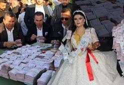 Gelini altına damadı paraya boğdular! Düğün 2 gün sürdü, 1 ton et tüketildi