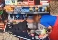 Avcılar’da marketten hırsızlık kamerada: Çaldıklarını bebek arabasına gizledi